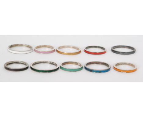 Ten assorted rings each with a different coloured enamel decoration, various sizes all from the studio of Bernard Instone, un