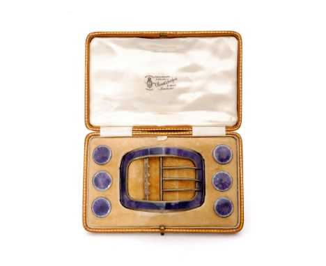 An Edwardian hallmarked silver and enamel buckle and button set, composed of shaped rectangular belt buckle and six matching 