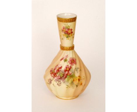 A large Royal Worcester blush ivory shape 1452 vase of fluted wrythen form, the body decorated with spring flowers and foliag