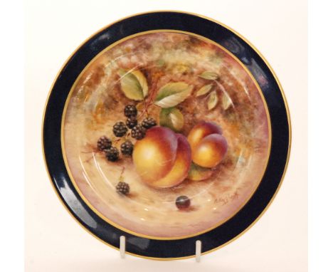 A small Royal Worcester Fallen Fruits cabinet plate decorated by P. English with hand painted peaches and blackberries within