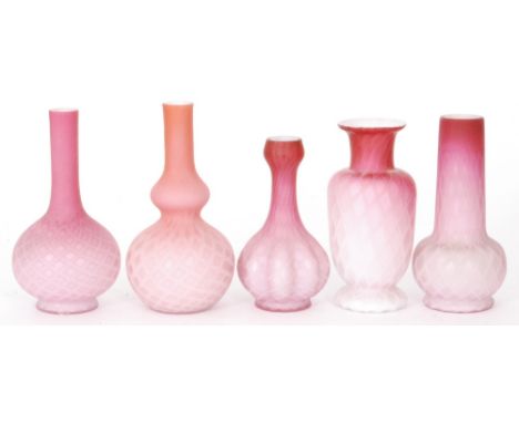 A group of late 19th Century satin quilted air trap glass comprising a footed sleeve form vase with a flared neck, a fluted g