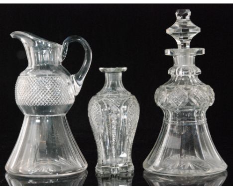 An early 20th Century Edinburgh crystal glass water jug in the form of a thistle with faceting to the base below a band of st