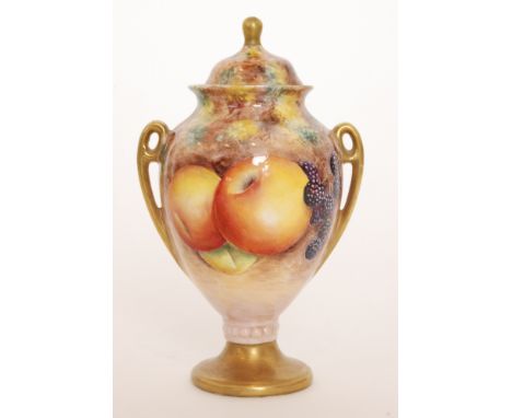 A later 20th Century pedestal vase and cover decorated by former Royal Worcester artist G. Delaney in the Fallen Fruits style