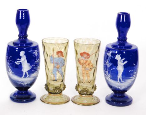 A pair of late 19th Century Bohemian glass vases of footed form with applied raspberry prunts and decorated with figures in e