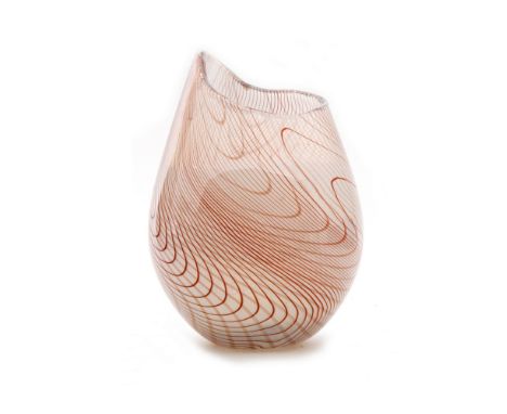 A large contemporary studio glass Distortion vase by Phill Attril, of ovoid form with abstract form rim, decorated with rando