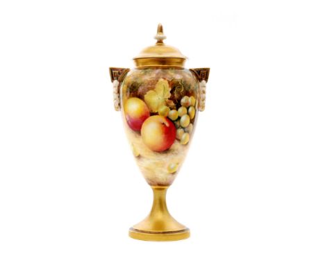 A Royal Worcester Fallen Fruits pedestal vase and cover decorated in the round by Leaman with hand painted pears and blackber