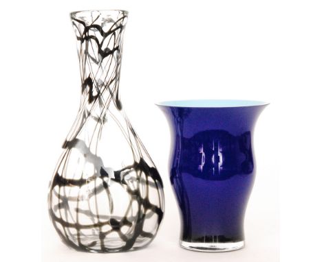 A contemporary Nason Italian Murano glass vase of swollen form with a flared neck cased in clear crystal over deep blue over 