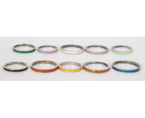 Ten assorted rings each with a different coloured enamel decoration, various sizes all from the studio of Bernard Instone, un