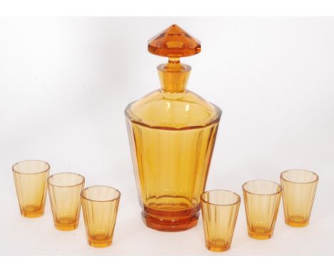 A 1930s Czech glass liqueur set by Karel Palda to include a decanter of shouldered form with faceted body, height 21cm, toget