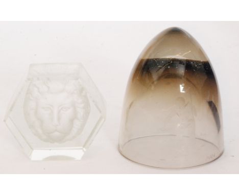 A later 20th Century Caithness paperweight commemorating the 1969 moon landing, the ovoid form in cinnamon cased in clear cry