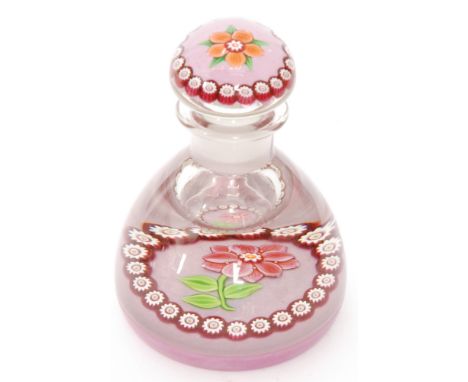 A 20th Century Paul Ysart glass paperweight inkwell with central lampwork pale red flower surrounded by a ring of red and whi