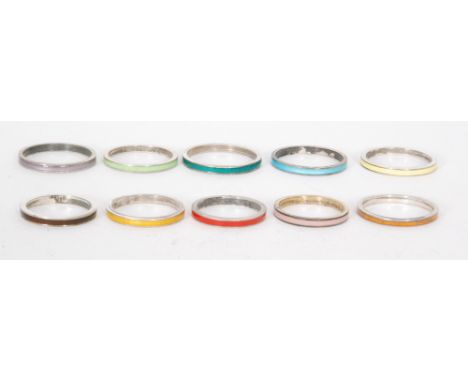Ten assorted rings each with a different coloured enamel decoration, various sizes all from the studio of Bernard Instone, un
