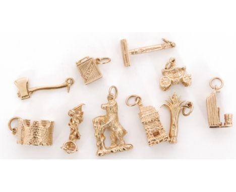 Ten assorted 9ct hallmarked charms to include an axe, a razor, a sundial, a carriage etc, total weight 26.5g, Bernard Instone