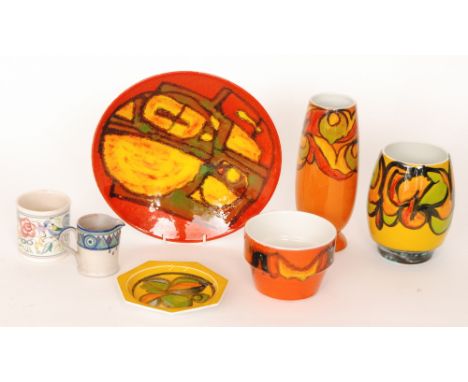 Seven pieces of assorted Poole Pottery comprising five pieces of post war Delphis ware to include a shape 4 shallow bowl deco