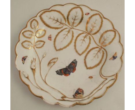 A Chamberlains Worcester dish, decorated with butterflies and insects with gilt moulded decoration to a shaped border, diamet