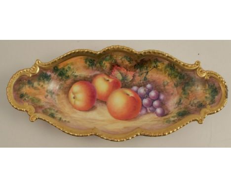 A Royal Worcester oval pin dish, decorated with hand painted fruit, diameter 10ins - two chips to edge