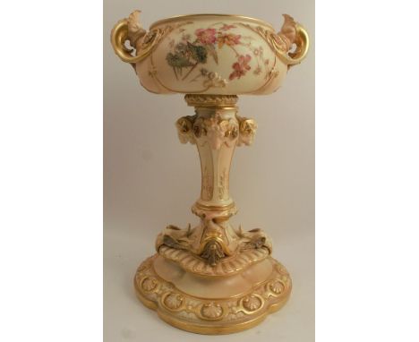 A Royal Worcester blush ivory pedestal bowl, decorated with flowers, with gilt moulded decoration, shape number 1584, dated 1