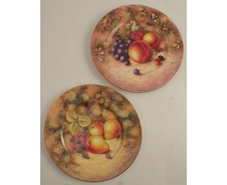 Two Royal Worcester plates, decorated with hand painted fruit by Freeman and J Smith, diameter 10.5ins - both in good conditi