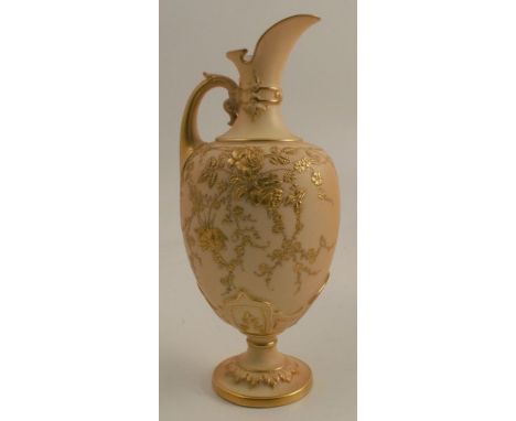 A Royal Worcester blush ivory ewer, richly gilded with roses and leaves, raised on a pedestal foot, shape number 1581, height