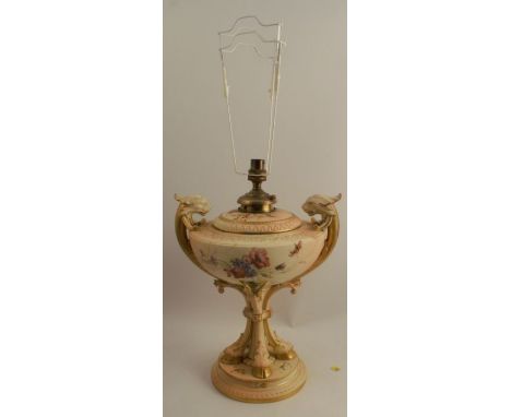 A Royal Worcester blush ivory oil lamp, decorated with floral sprays, butterflies and insects by Edward Raby, with lift out o