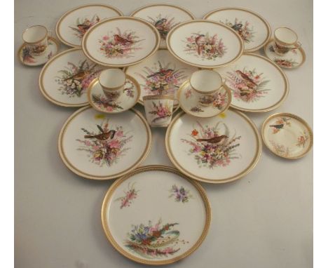A collection of 19th century Worcester plates, cups and saucers, decorated with birds and foliage, with jewelled borders -&nb