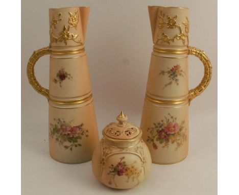 A pair of Royal Worcester blush ivory claret jugs, decorated with floral sprays, shape number 1047, height 10ins, together wi