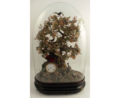 A Victorian singing bird automaton clock, with tweeting birds amongst the boughs of a wirework and flower adorned rose bush, 