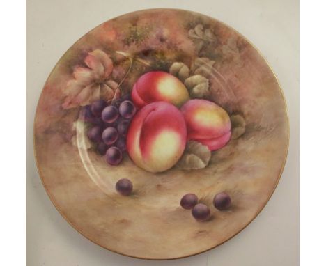 A Royal Worcester cabinet plate, decorated with fruit to a mossy background, unsigned, diameter 10.75ins - Good condition