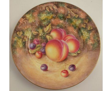 A Royal Worcester cabinet plate, decorated with fruit to a mossy background by G Bowen, diameter 10.75ins - Good condition