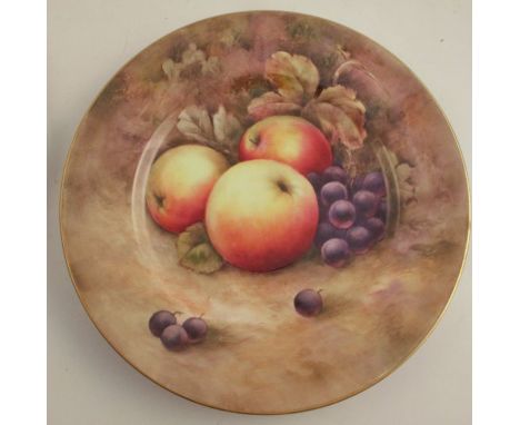 A Royal Worcester cabinet plate, decorated with fruit to a mossy background, unsigned, diameter 10.75ins - Good condition