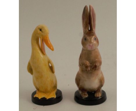 Two Royal Worcester models, a duck and a rabbit, both on black circular bases, model number 2843 and 2848, height 4ins and 5i