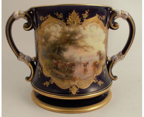 A Royal Worcester two handled mug, of waisted form decorated with a blue ground reserving a panel painted with English cattle