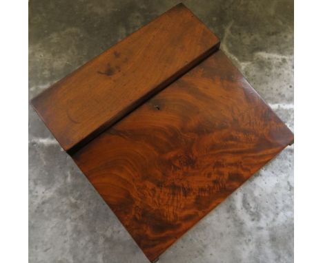 A 19th century mahogany lap desk, with folding sloping writing surface and covered compartments, width 11.5ins