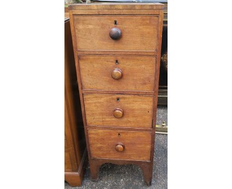 A 19th century mahogany chest, of four short drawers, on bracket feet, width 16ins, height 44ins, depth 18.5ins