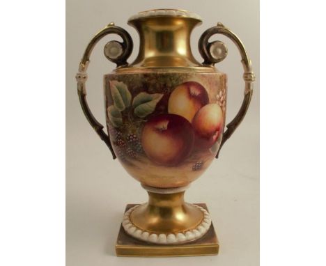 A Royal Worcester pedestal vase, decorated all around with fruit to a mossy background by Skerrett, raised on a square foot, 