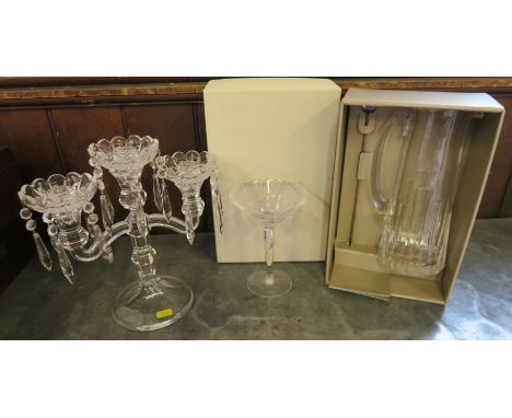 Jasper Conran for Stuart Crystal, a boxed pair of martini glasses and a boxed jug, together with a glass three light candelab
