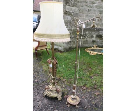 A brass and copper telescopic lamp standard, decorated with flowers and scrolls, together with another brass standard lamp ha