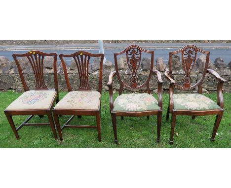 A pair of reproduction mahogany open arm dining chairs, together with a pair of mahogany dining chairs, all with tapestry dro