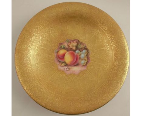 A Royal Worcester tazza, decorated with a central panel of fruit by Reed, to an etched acid gilt ground, diameter 9.5ins - Go