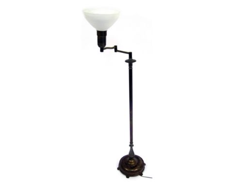 A mid 20thC brass Anglepoise standard lamp, with later opaque glass shade, on a circular foot, 145cm high.