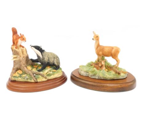 Two Border Fine Arts figure groups, comprising badger and squirrel B0205, and The Chiltern Collection deer RW7, each on a har