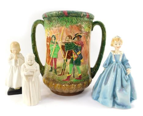 A group of ceramics, comprising a Royal Worcester porcelain figure of Grandmother's Dress, JO81, a Royal Worcester candle snu