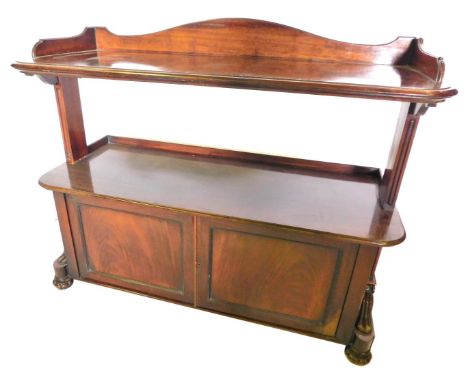 A Victorian mahogany two tier buffet, with a raised back, the first tier with moulded edge, on plain end supports, the base w