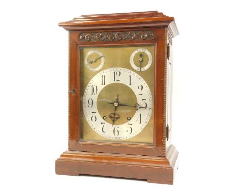 A late 19thC German mahogany bracket clock by Winterhalder &amp; Hofmeier, with pierced fret back, and a brass and silvered n