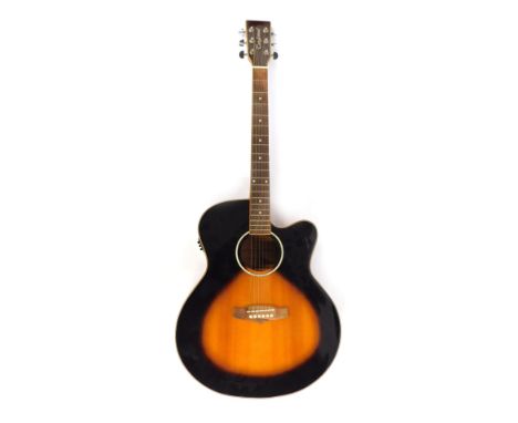 A Tanglewood Guitar Company acoustic guitar, model Evolution, TSJCVES, Serial No MD-08097-YX, 105cm high.