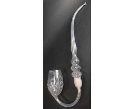 A Victorian glass Nailsea type whimsy pipe, pale pink glass scroll decoration, 74cm long.