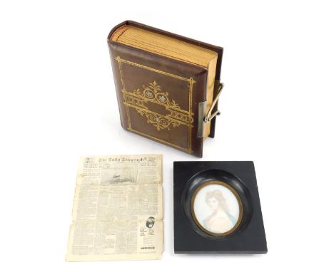 A Victorian leather and gilt tooled album, containing various portrait studies, together with a miniature Daily Telegraph new