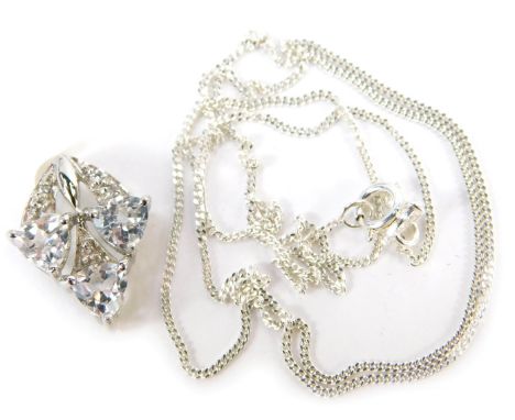 A pendant and chain, the arched pendant set with cz and heart shaped cut white stones, in claw setting, on fine link neck cha