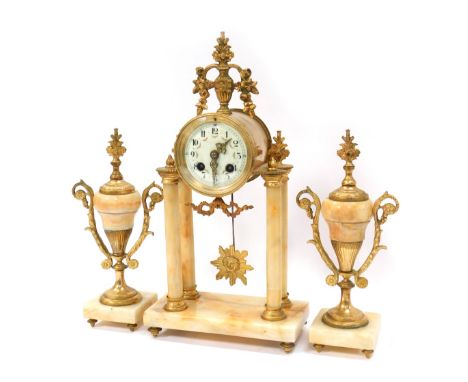 A 19thC French marble clock garniture set, the timepiece with cream floral decorated numeric face, in gilt casing with urn sw