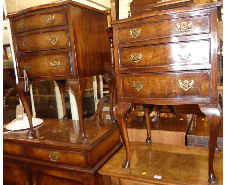 A pair of mid-20th century figured walnut and crossbanded serpentine front bedside chests, each of three long graduated drawe